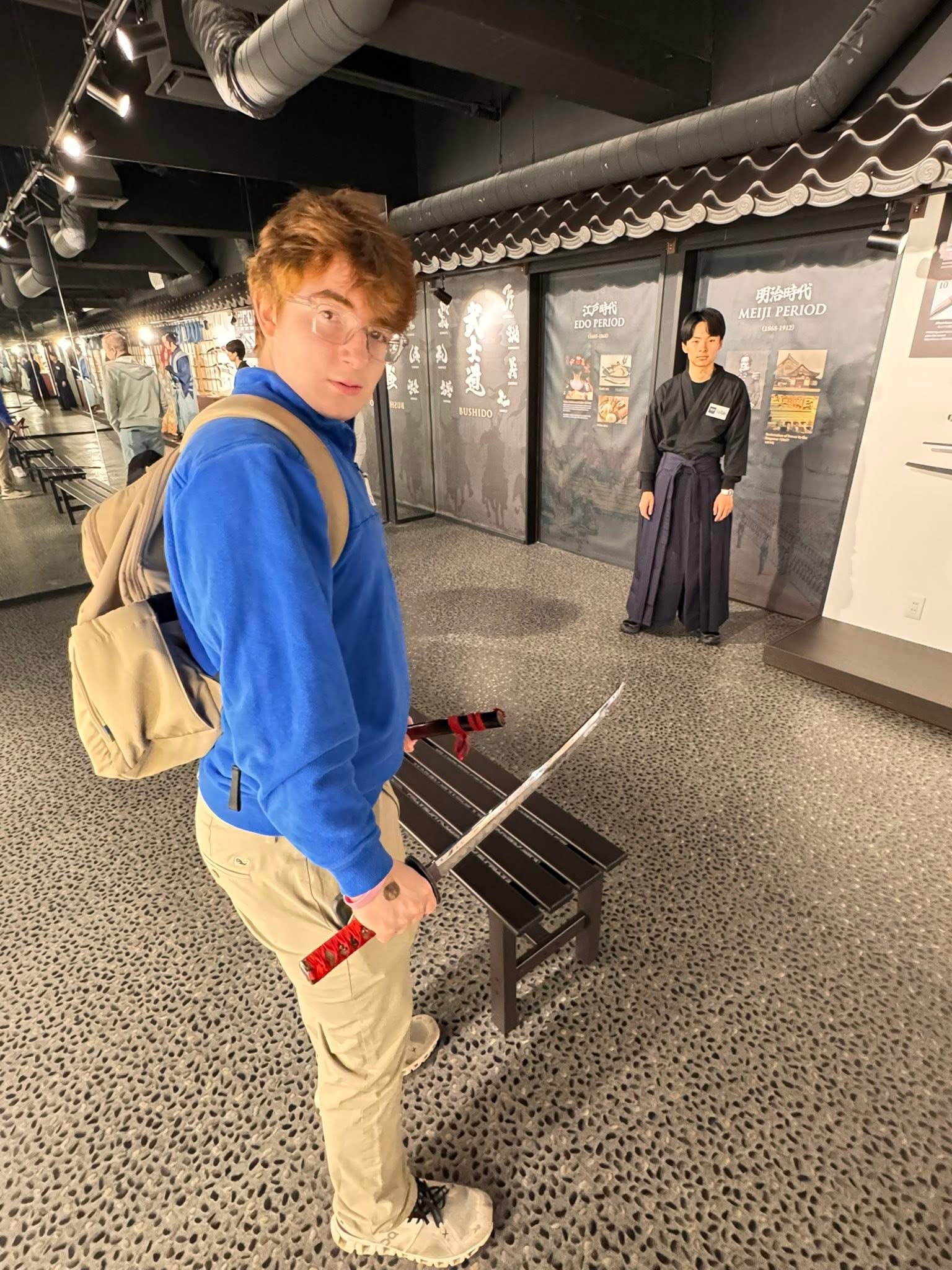 Blue hoodie with katana at Samurai Museum