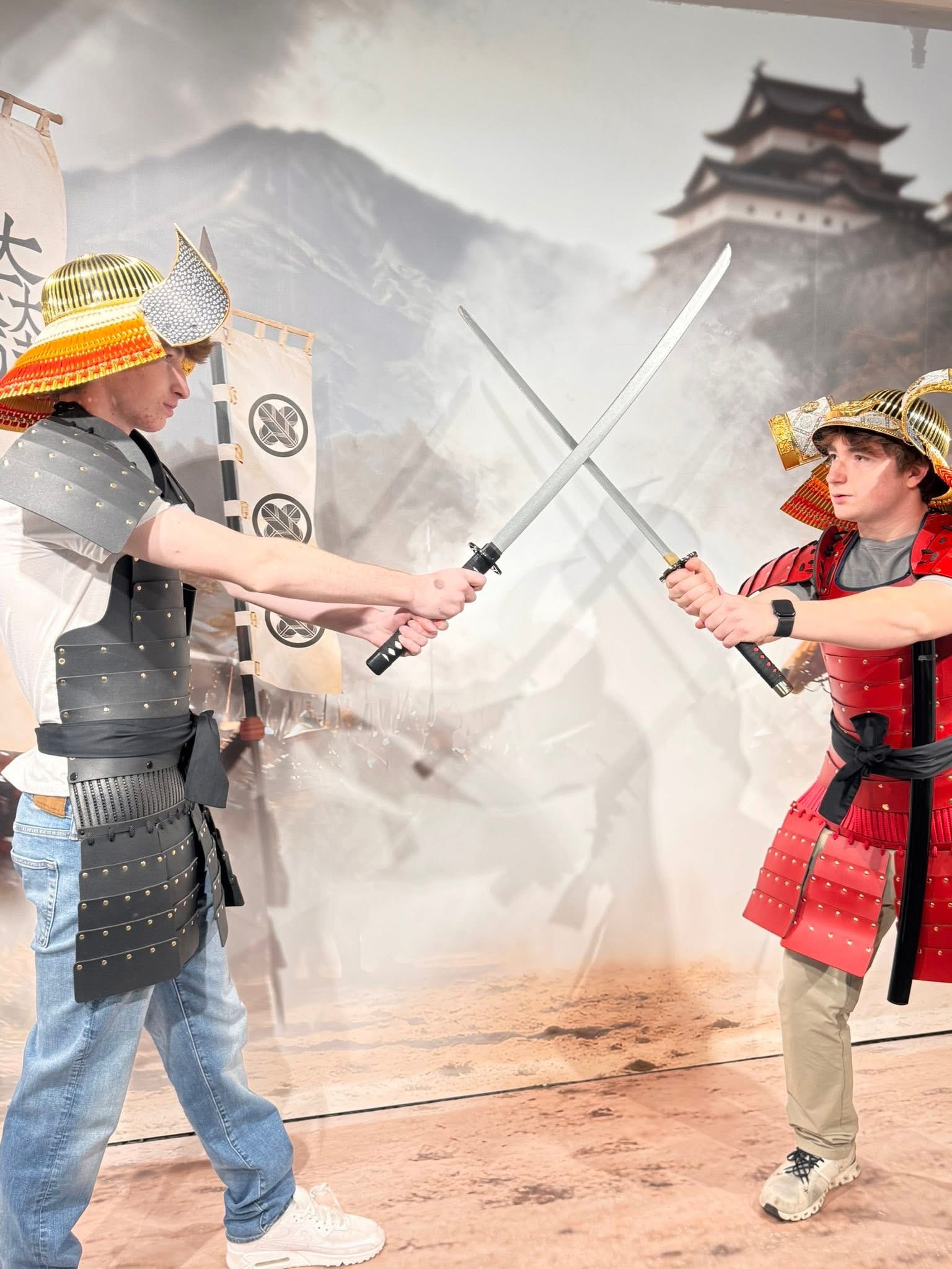 Both boys in full samurai armor