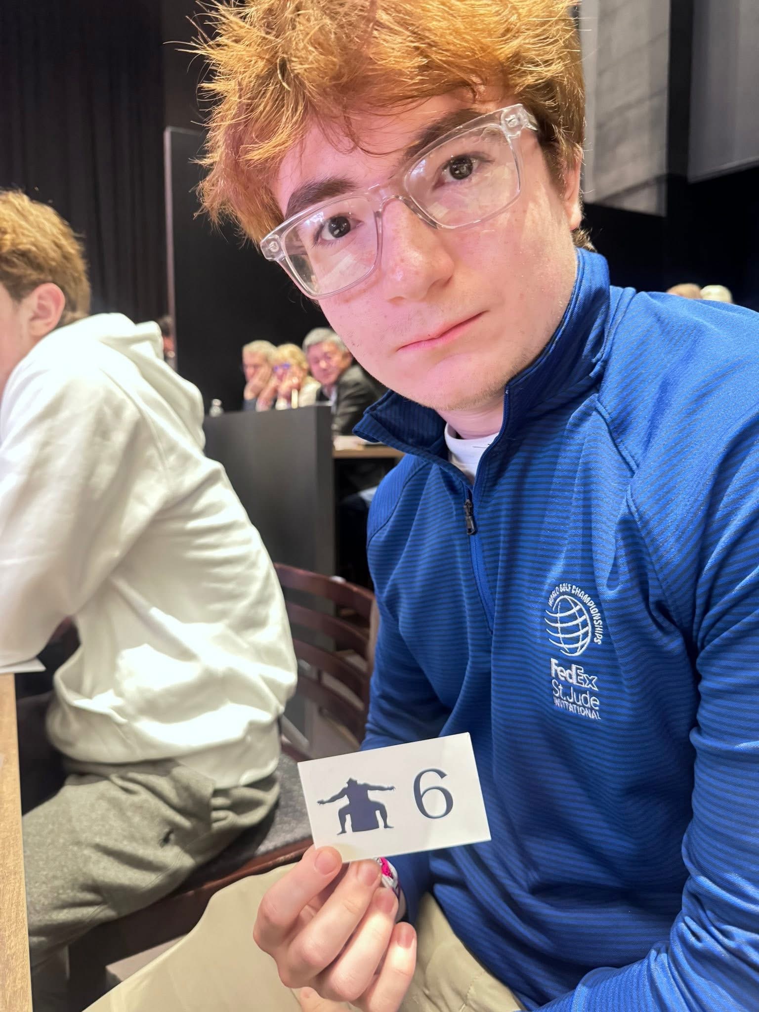 Holden with number 6 card
