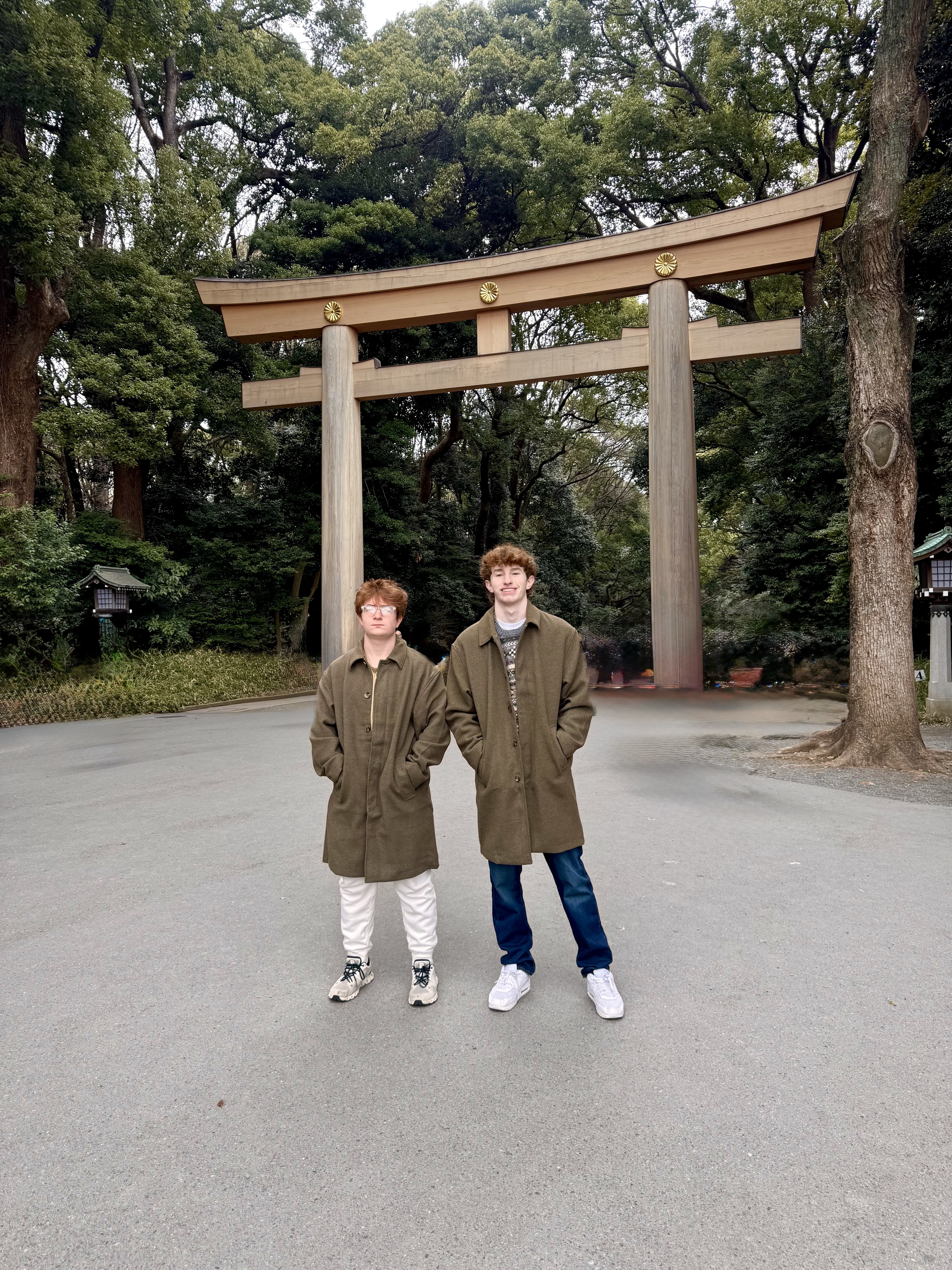 Boys at Meiji Jingu torii gate
