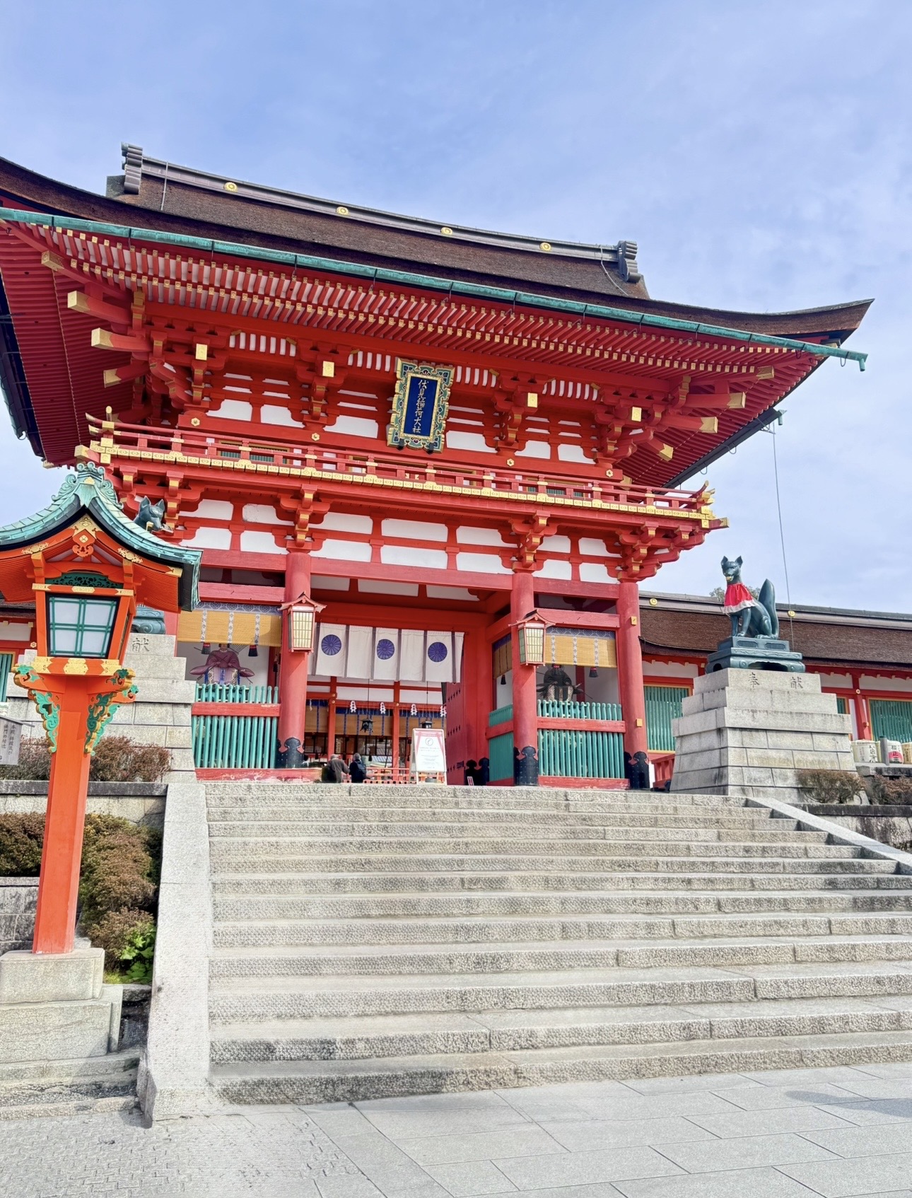 Fushimi Inari main gate with fox guardian